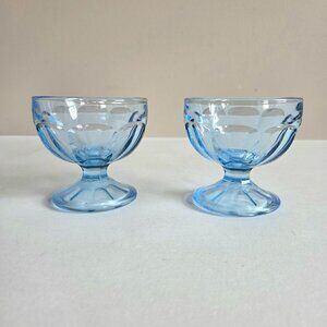 Light blue glass ice cream or sherbet footed glasses/bowls.